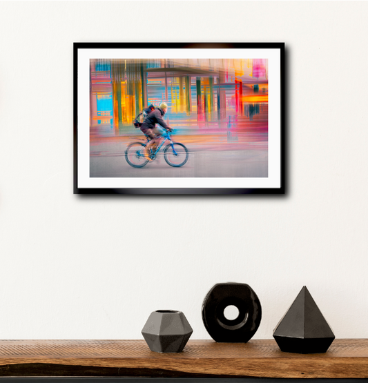 Candy Rush a cyclist riding through Oslo city streets — ICM photography cycling wall art print by Douglas Carr at Oslo Art Prints