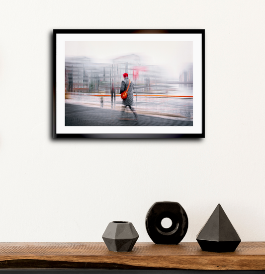 Crimson Passage a man walking through Oslo Bjørvika — ICM photography cycling wall art print by Douglas Carr at Oslo Art Prints