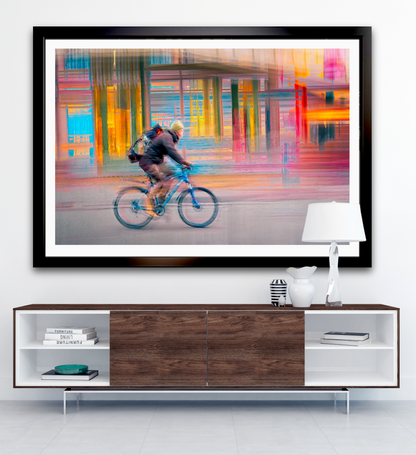 Candy Rush a cyclist riding through Oslo city streets — ICM photography cycling wall art print by Douglas Carr at Oslo Art Prints