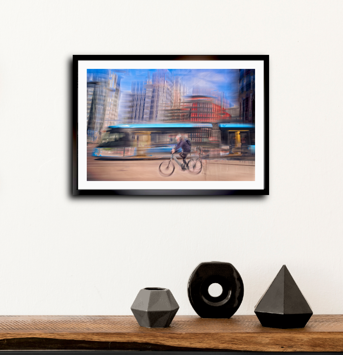 Downtown Deadline, a cyclist racing a tram through Oslo city streets — ICM photography cycling wall art print by Douglas Carr at Oslo Art Prints
