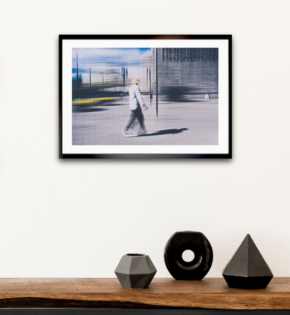 Passing Light a man walking through Oslo city streets pass the National Museum— ICM photography cycling wall art print by Douglas Carr at Oslo Art Prints