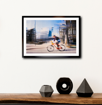 Passing Munch, a cyclist riding through Oslo city streets — ICM photography cycling wall art print by Douglas Carr at Oslo Art Prints