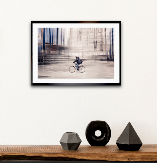 Silent Commuter, a cyclist riding through Oslo city streets — ICM photography cycling wall art print by Douglas Carr at Oslo Art Prints