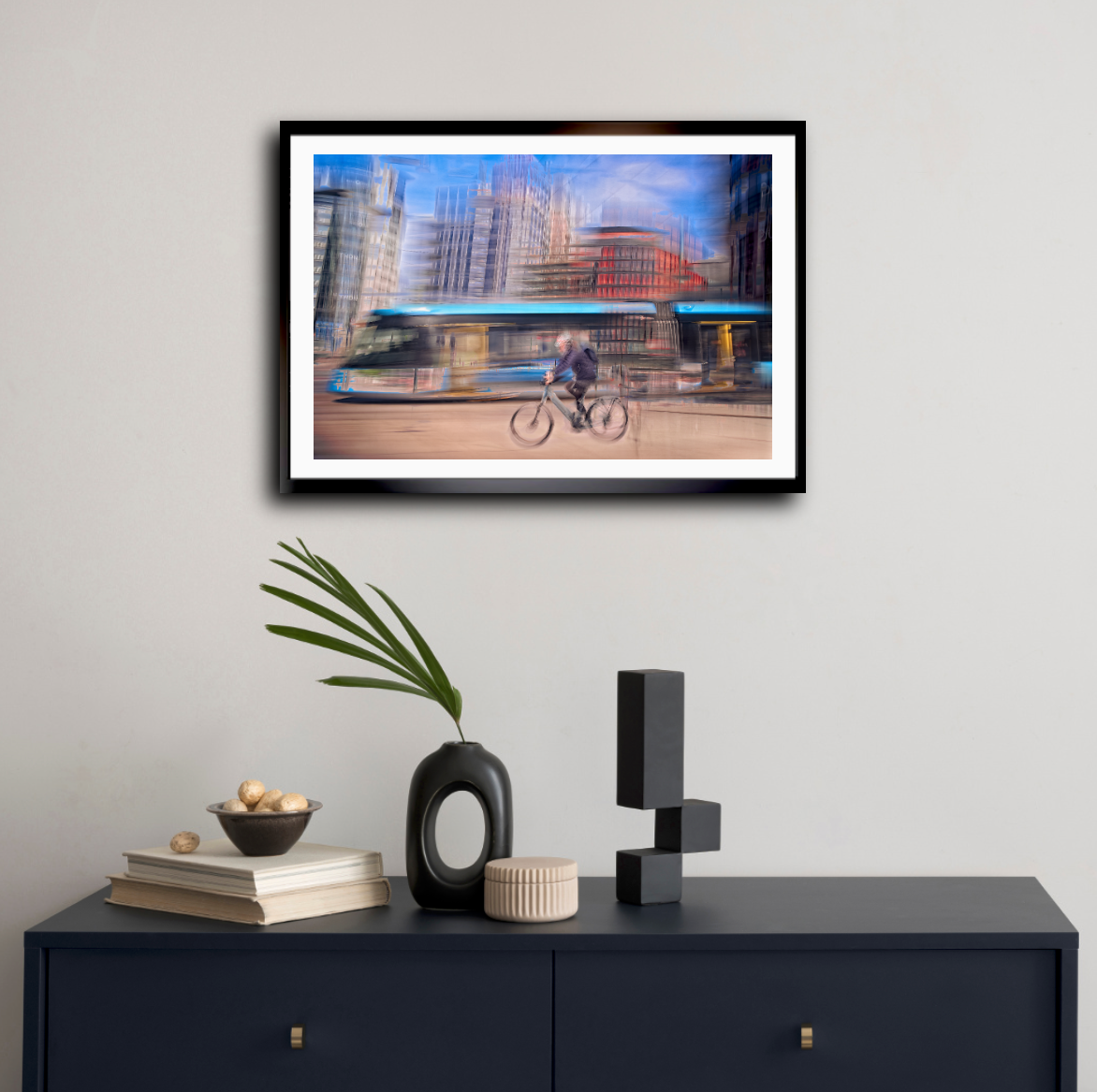 Downtown Deadline, a cyclist racing a tram through Oslo city streets — ICM photography cycling wall art print by Douglas Carr at Oslo Art Prints