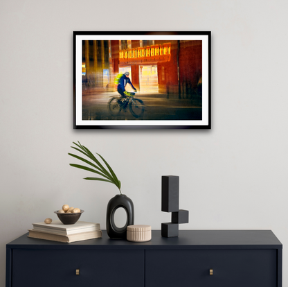 Passing Neon, a cyclist riding through Oslo city streets — ICM photography cycling wall art print by Douglas Carr at Oslo Art Prints