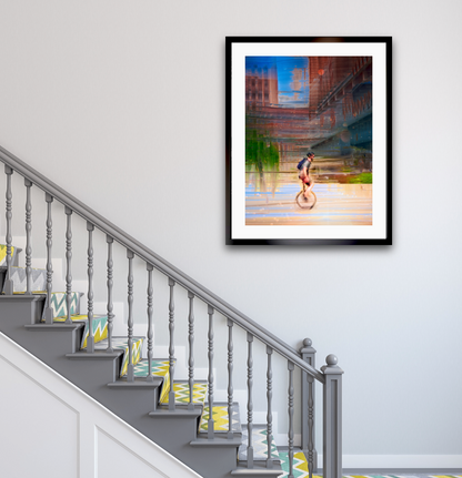Circus Life person cycling on a unicycle  past Oslo Rådhus Oslo city on there daily commute — ICM photography cycling wall art print by Douglas Carr at Oslo Art Prints. Free worldwide shipping.