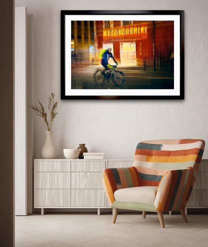 Passing Neon, a cyclist riding through Oslo city streets — ICM photography cycling wall art print by Douglas Carr at Oslo Art Prints