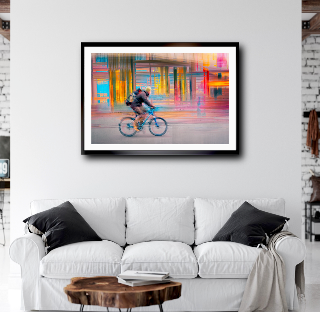 Candy Rush a cyclist riding through Oslo city streets — ICM photography cycling wall art print by Douglas Carr at Oslo Art Prints