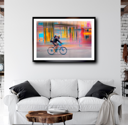 Candy Rush a cyclist riding through Oslo city streets — ICM photography cycling wall art print by Douglas Carr at Oslo Art Prints
