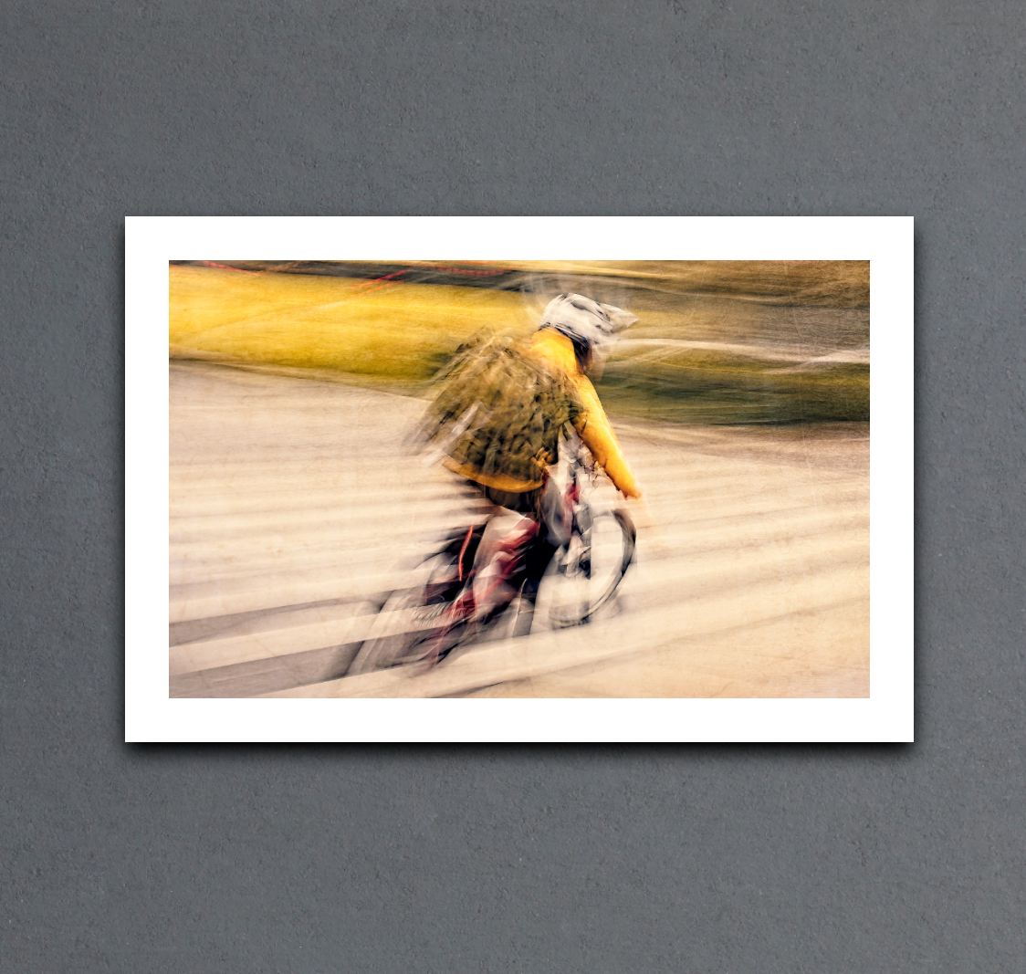 Autumn Rush, a cyclist riding through Oslo city streets — ICM photography cycling wall art print by Douglas Carr at Oslo Art Prints