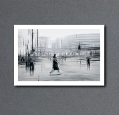 Blurred Intentions a person walking down Karl Johan in Oslo city towards Oslo train station  — Black & White ICM photography cycling wall art print by Douglas Carr at Oslo Art Prints