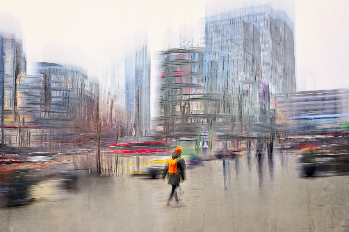 Carrying Silence a person walking through Oslo city streets towards Oslo S with a orange backpack — ICM photography cycling wall art print by Douglas Carr at Oslo Art Prints