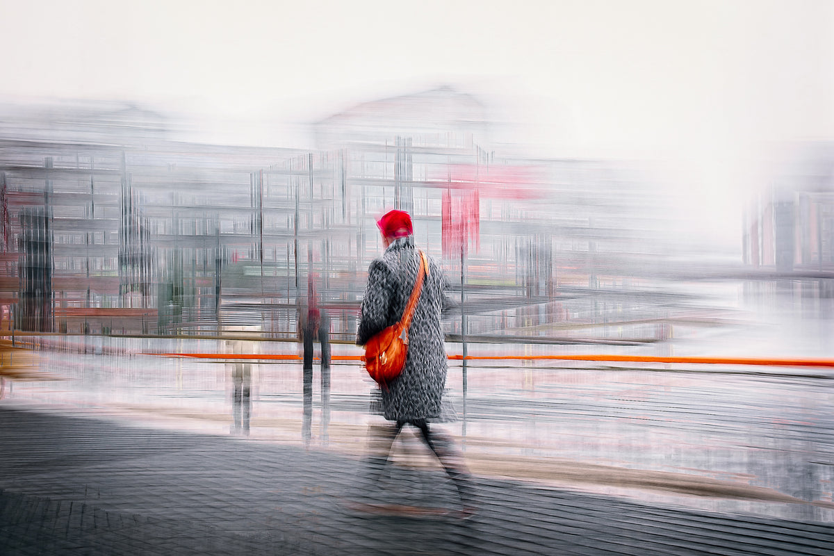 Crimson Passage a man walking through Oslo Bjørvika — ICM photography cycling wall art print by Douglas Carr at Oslo Art Prints