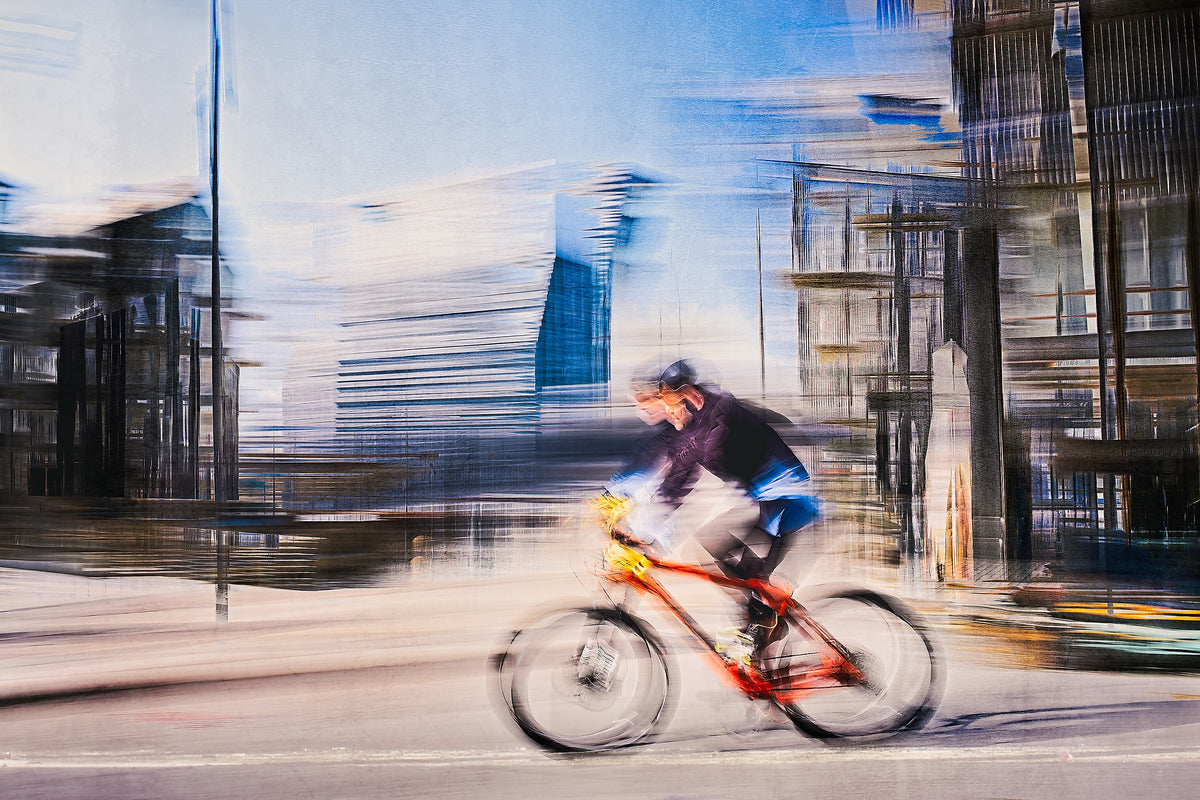 Passing Munch, a cyclist riding through Oslo city streets — ICM photography cycling wall art print by Douglas Carr at Oslo Art Prints