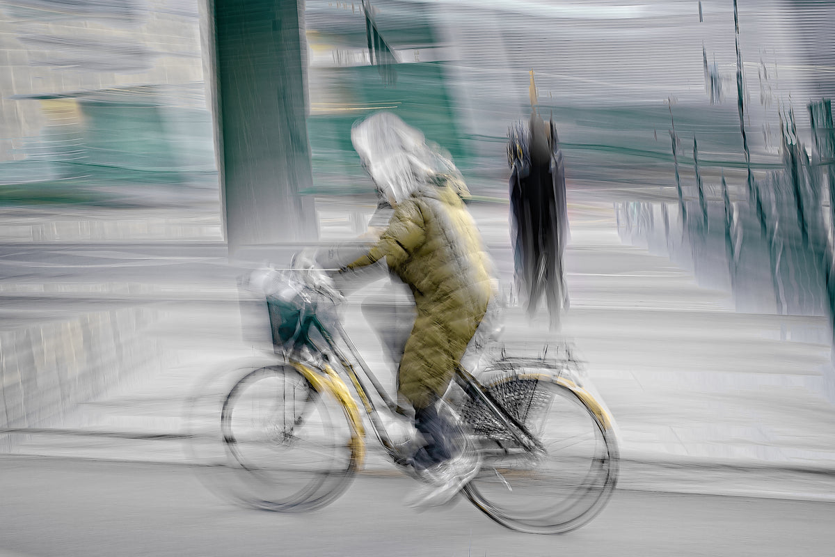 Seasoned Cyclist, a cyclist riding through Oslo city streets — ICM photography cycling wall art print by Douglas Carr at Oslo Art Prints