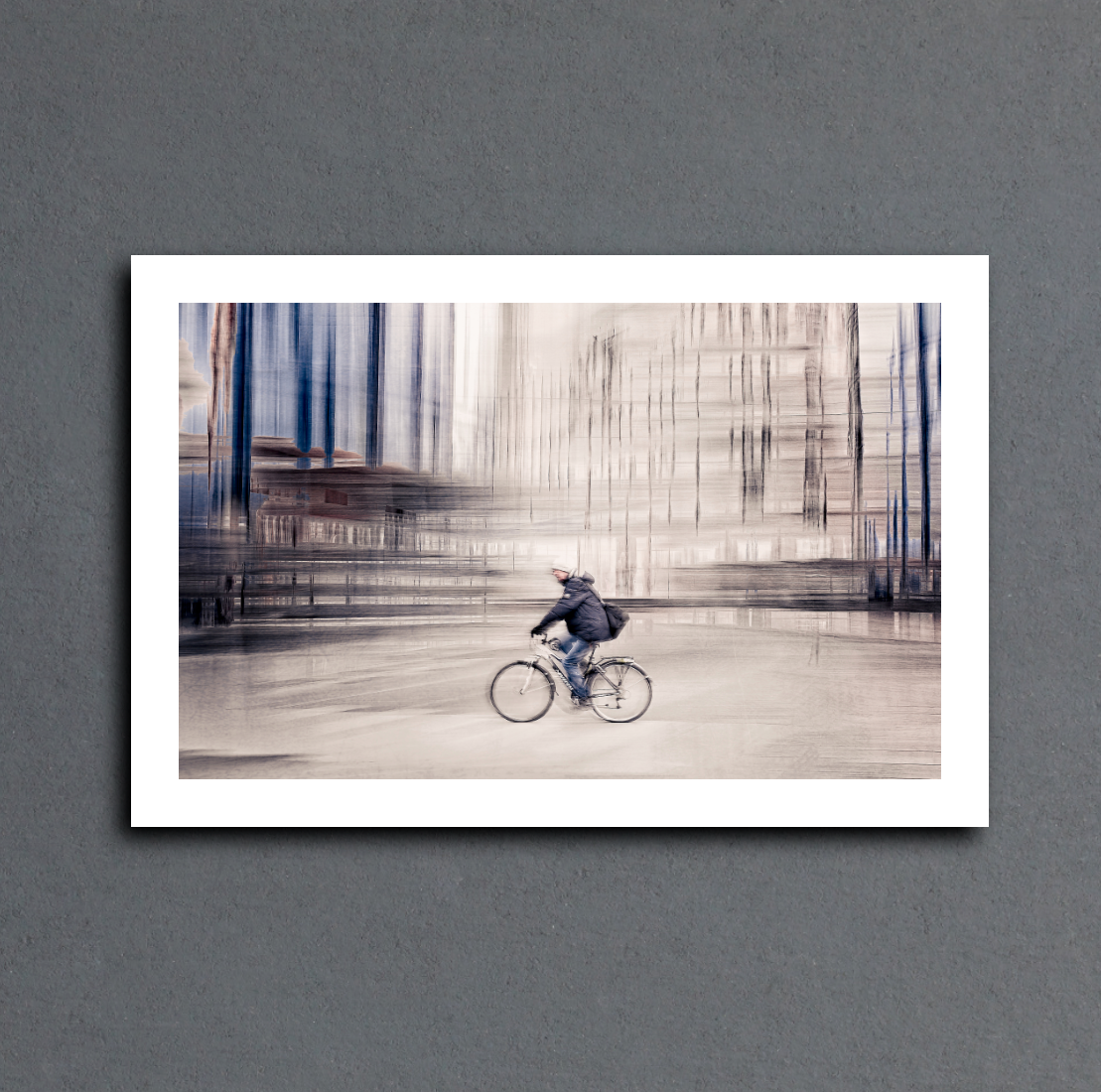 Silent Commuter, a cyclist riding through Oslo city streets — ICM photography cycling wall art print by Douglas Carr at Oslo Art Prints